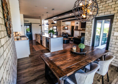 Rustic Kitchen and Dining Room Built By Hillside Construction. Building Custom Homes, Cabins, and Renovations in Manitoba and Kenora.