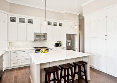A Bright White Kitchen Built By Hillside Construction. Building Custom Homes, Cabins, and Renovations in Manitoba and Kenora.