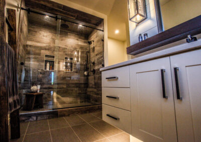 Tile Shower in bathroom Built By Hillside Construction. Building Custom Homes, Cabins, and Renovations in Manitoba and Kenora.