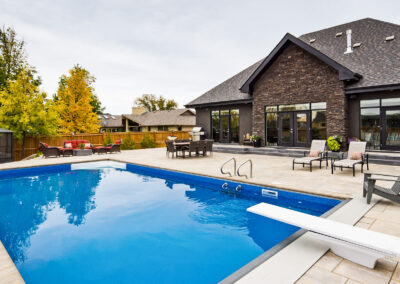 Pool In The Back Yard Of A Home Built By Hillside Construction. Building Custom Homes, Cabins, and Renovations in Manitoba and Kenora.