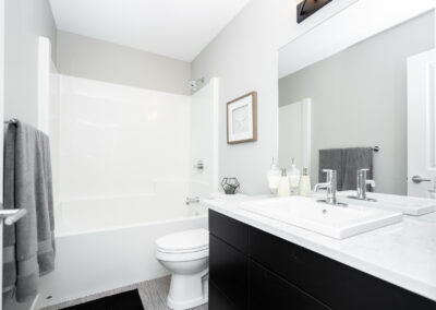 Bright Bathroom In A Multi Family Building Built By Hillside Construction In Manitoba