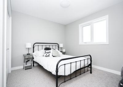 Bedroom In A Multi Family Building Built By Hillside Construction In Manitoba