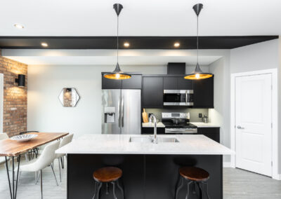 Bright Kitchen and Dining Room In A Multi Family Building Built By Hillside Construction.