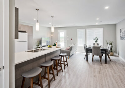 Bright Kitchen and Dining Room In A Multi Family Development Built By Hillside Construction In Manitoba.